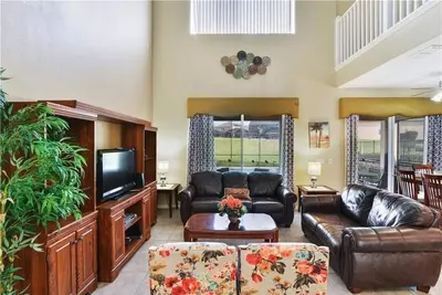 Image de 8bd / 4. 5ba, piscine privée / Spa, 8 télévisions, WiFi, salle de jeux, à 3 miles de Disney