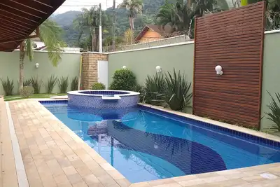 Image de Maison Sao Vicente 4 suites avec piscine