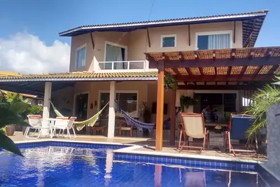 Image de Belle maison, 5 chambres, piscine, Cond Paradise, avec aire de jeux pour les enfants!
