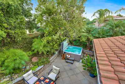 Image de True Suburban Oc - Retraite tropicale proche de Tout! 12 minutes de Disney