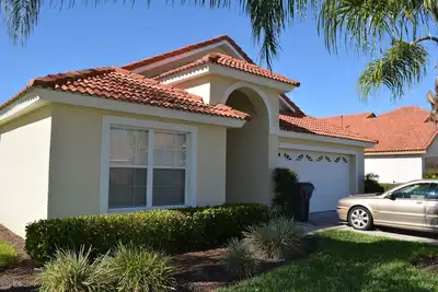 Image de Belle villa dans une gated community 5 Bdrm 4 salles de bain de la piscine & spa privé près de Disney