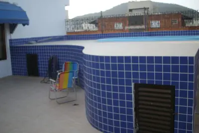 Image de Couverture - les chambres-2 salles de bains de Guaruja Bay et une suite - Piscine, des barbecues