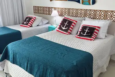 Image de Belle Ape 1 chambre \/ piscine \/ grand espace de loisirs \/ Wi-Fi \/ gar \/ avant de Praia Grande