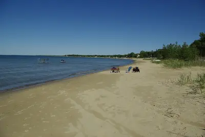 Image de Belle maison au bord de l'eau avec des couchers de soleil spectaculaires et une magnifique plage de sable de sucre