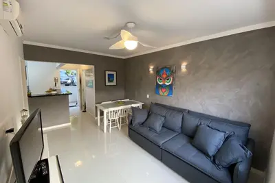 Image de Apartamento Ubatuba - Praia das Toninhas - Cond. Pied dans le sable. 2 tambours et 2 bains