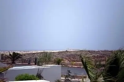 Image de Bungalow de deux chambres avec parking et vue dans un endroit calme.