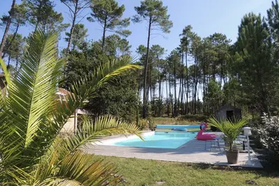 Image de Charmante villa en bois, dans la forêt, proche plages 4chambres, 1sdb + 2 Sdd
