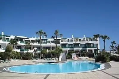 Image de Playa Bastian, appartement au rez-de-chaussée, beau complexe, Wifi, proche de toutes commodités