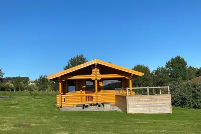 Image de Luxueuse cabane en rondins avec bain à remous, animaux acceptés