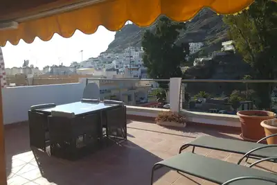 Image de Appartement élégant et grande terrasse privée sur le toit, au cœur de Puerto de Mogan