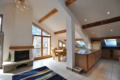 Image de Le Cochet Penthouse, A Loft-style, Chalet-apartment 30 metres from the ski lift