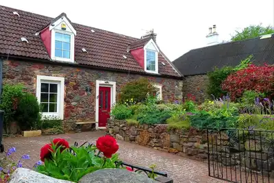 Image de Gîte de 2 chambres dans charmant village au bord de la mer