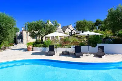 Image de Trullo avec piscine privée (15x7), Wi-Fi gratuit, table de tennis, vélo de montagne disponible