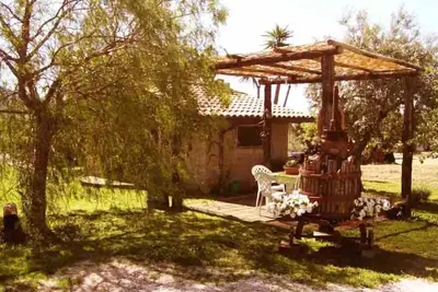 Image de Maison De Vacances Roma avec jardin entouré de verdure de le châteaux romaine