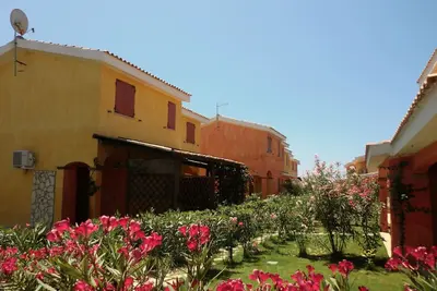 Image de Belle maison dans un village de vacances 1 km. De Porto Pino