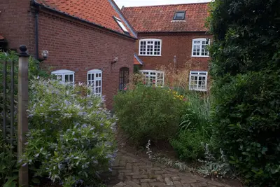 Image de Logement spacieux et attrayant avec jardin plein sud