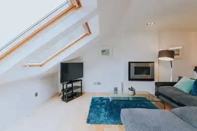 Image de L'appartement Penthouse (Wi-Fi, Parking, Netflix)