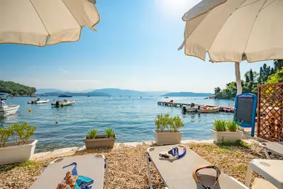 Image de Cottage Olgas - sur Agni Beach, offrant une vue imprenable et tranquillité