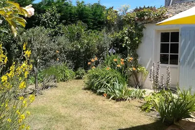 Image de Maison 140 m2 - Wifi- à 100m de la plage. 3 chambres - 3 salles de bain -3 Wc