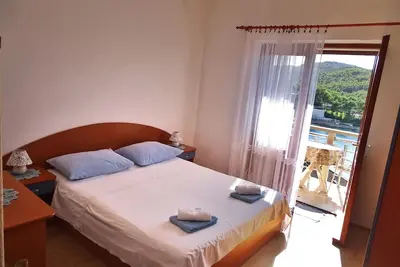 Image de Appartement de deux chambres avec le balcon et la vue sur le mer Povlja, Brac (A-14399-c)