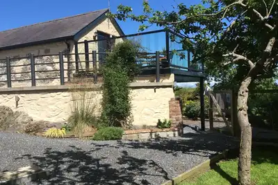 Image de Retraite romantique de conversion de grange à Orchard Cottage