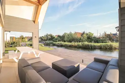 Image de Stavoren 8p, villa neuve sur l'eau, chaque chambre avec salle de bain privée