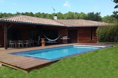 Image de Maison en bois de 120m2 avec piscine, proche Capbreton, Hossegor