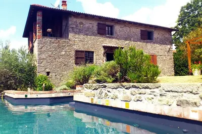 Image de Casa Quintilio, où élégance et rustique se marient harmonieusement
