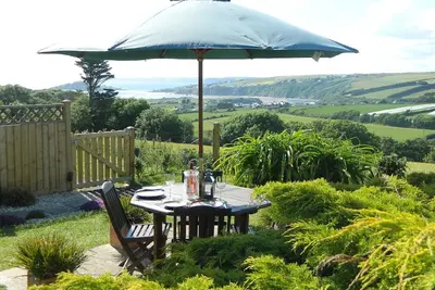 Image de Une escapade relaxante avec vue sur la mer. Jardin privé. Chien bienvenus. Plages de sable. Brûleur de bûches