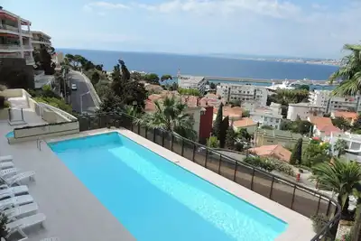 Image de Appartement avec vue panoramique sur la mer et piscine commune