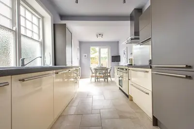 Image de Location de vacances indépendante de 2 chambres avec jardin privé