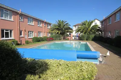 Image de Offre spéciale. Bel appartement avec piscine extérieure chauffée à 2 minutes de la plage de sable