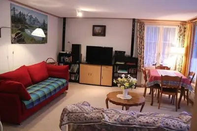 Image de Lauterbrunnen Staubbach apartment  : view of mountains, waterfall, river, terrase