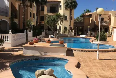Image de Playa 111, 2 chambres 2 salle de bain appartement au rez-de-chaussée à 2 minutes à pied de la plaza WiFi
