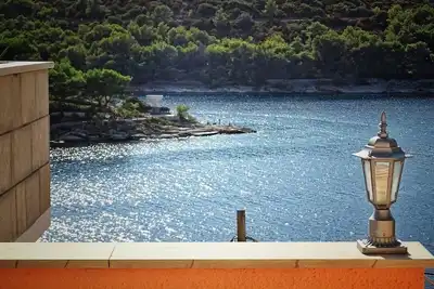 Appartement d'une chambre avec la terrasse et la vue sur le mer Povlja, Brac (A-14399-b)