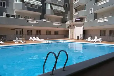 Image de Appartement de luxe de 3 chambres avec piscine communautaire et Wifi.