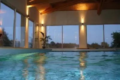 Image de Meublé de Tourisme Classé 5* avec 3 chambres, piscine intérieure chauffée à 30°