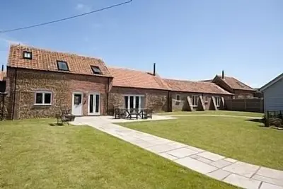 Image de Conversion de grange avec confort de luxe et bel emplacement cĂ´tier