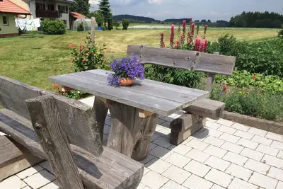 Image de Appartement 4 étoiles à la ferme ; appartement spacieux dans un écrin de verdure