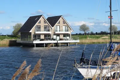 Image de ♥ Perle à la marina ♥, maison sur pilotis à Carolinensiel - Harlesiel