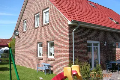 Image de Ferienhaus Seehund sur la côte est de la Frise orientale avec 3 chambres