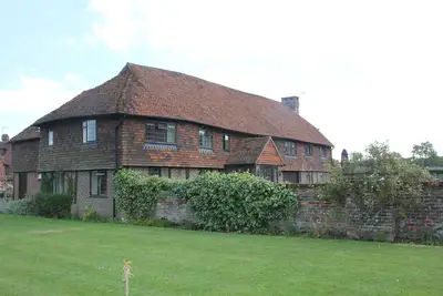 Image de Grange convertie de 4 chambres avec vue sur manoir dans un cadre champêtre calme