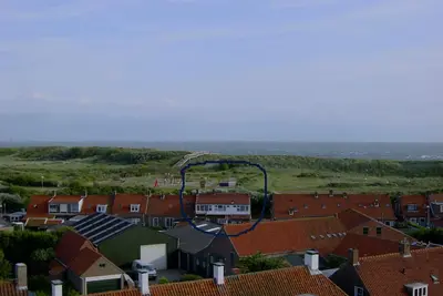 Image de Situé juste derrière les dunes / plage!