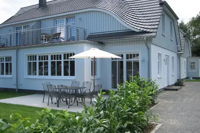 Image de petite maison de vacances confortable dans un emplacement central - à 10 minutes de la mer Baltique