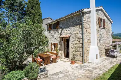 Image de Maison de vacances Mara en pierre, près de la mer dans un lieu de vacances calme, avec bain à remous extérieur