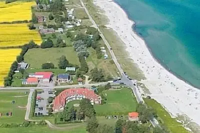 Image de Directement sur la plage avec vue sur la mer, balcon, chaise de plage, beheiz. U commun. Sauna.
