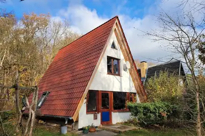 Image de maison de vacances confortable, meublée de façon individuelle, calme, très proche de la plage