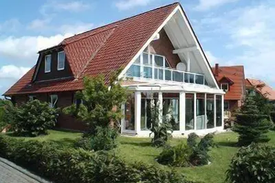 Image de Logement de toit calait et accueillant avec terrasse et loggia
