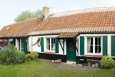 Image de Chalet rustique près de la plage sur Ortstand d'Oostduinkerke.