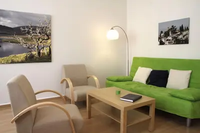 Moderne et chaleureux appartement de 3 chambres avec jardin